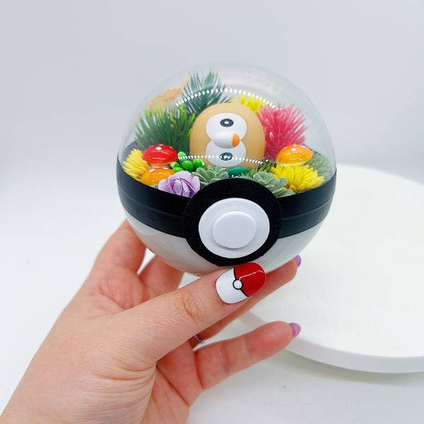 LIGHT UP Confused Rowlet Pokeball